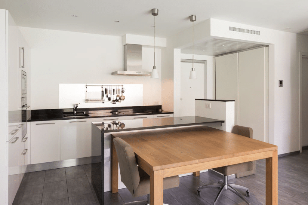 Kitchen bench with multi-level surfaces. Modern contemporary design by Wonderful Kitchens Australia. 