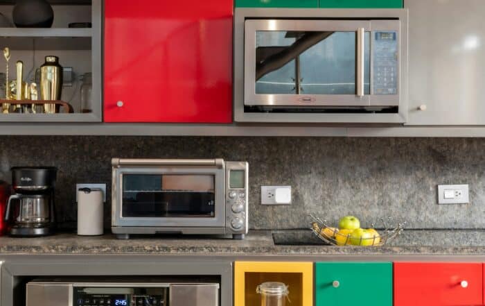 Modern vibrant contemporary kitchen with colours that POP! How to choose appliances that matches your kitchen design. Matching Appliances With Kitchen Design.