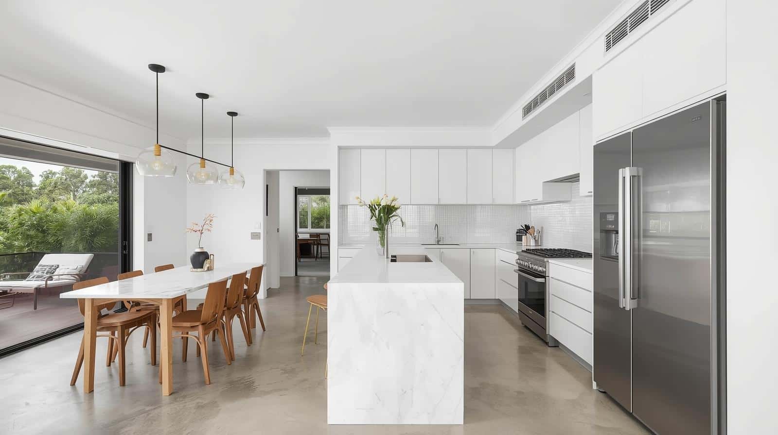 Contemporary kitchen renovation with open-plan design and modern finishes in Sydney suburban home