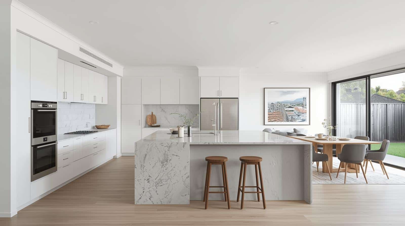 Modern Sydney kitchen renovation with island bench and integrated appliances
