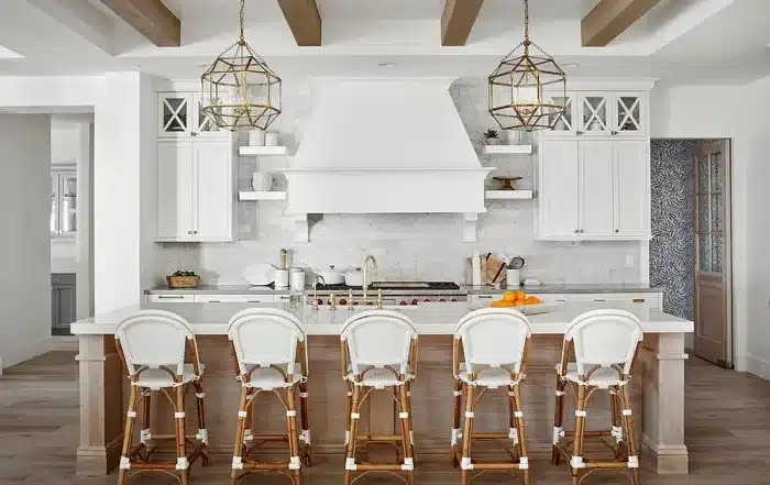 French provincial kitchen color palette featuring warm whites and cream cabinetry